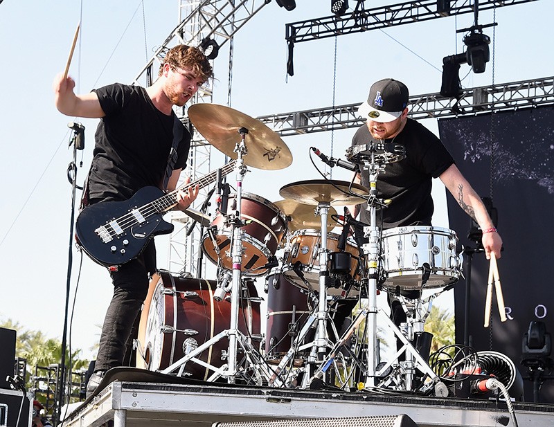 INDIO, CA - APRIL 11:  Musicians Mike Kerr (L) and Ben Thatcher of Royal Blood perform onstage during day 2 of the 2015 Coachella Valley Music & Arts Festival (Weekend 1) at the Empire Polo Club on April 11, 2015 in Indio, California.  (Photo by Frazer Harrison/Getty Images)